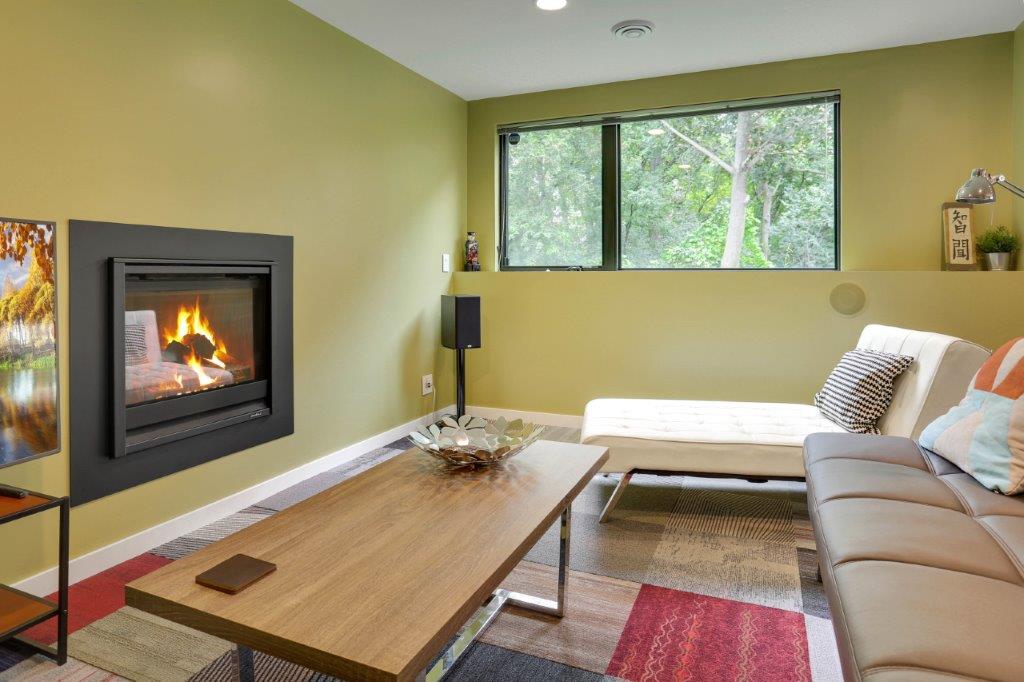 Minneapolis Modern Home Lower Level Rec Room with Fireplace