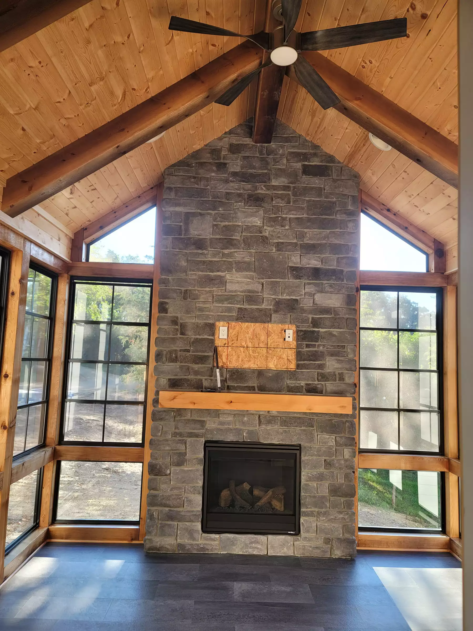 Vaulted 4-track porch with fireplace