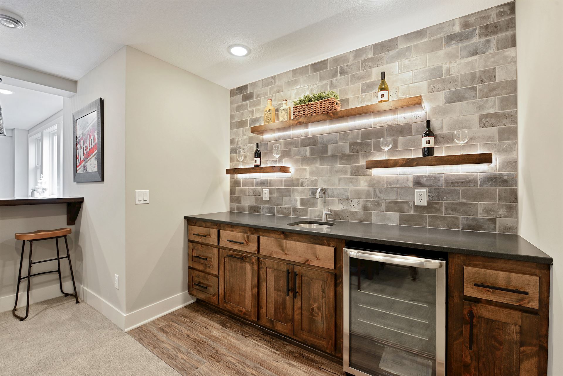 Wet Bar wall with lighted floating shelves