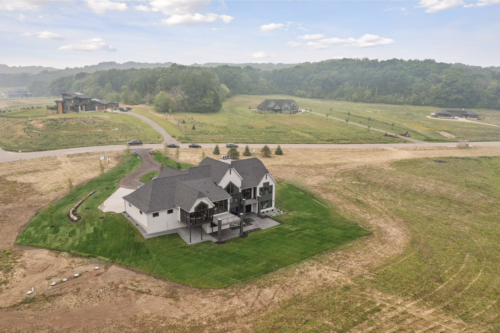 Aerial view of back of luuxury home