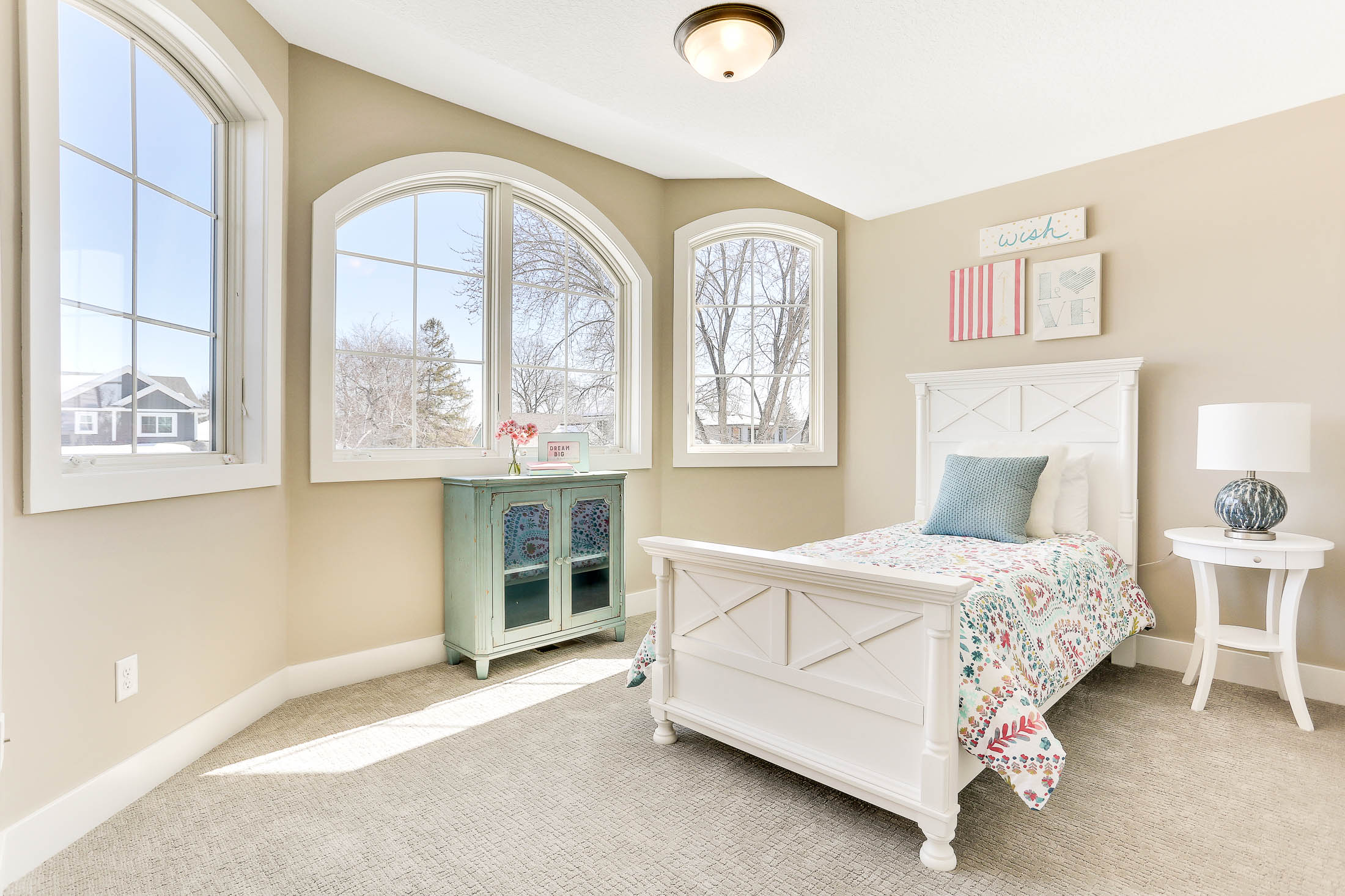 Arched windows in bedroom
